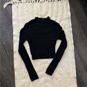Black fitted turtle neck free with purchase